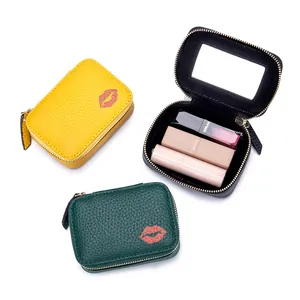 Kompakter Lippenstift-Organizer aus echtem Leder mit integriertem Spiegel und Lippenmuster