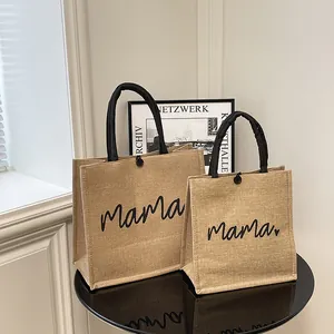 Set of two durable jute burlap tote bags with stylish Mama print and black woven handles