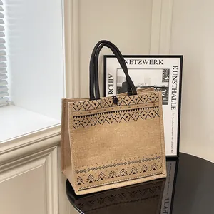 Large capacity natural jute tote bag with black ethnic geometric print and soft handles