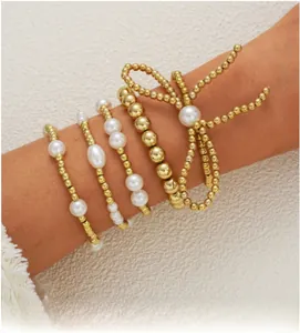 Elegante set di braccialetti a strati con perle e perline dorate, gioielli boho estivi