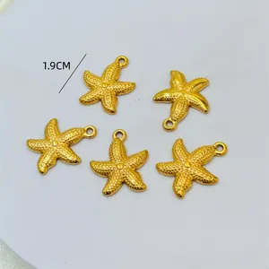 Macro detail of 1.9cm gold-toned textured starfish pendants for DIY jewelry making