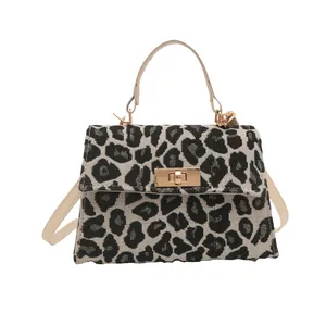 Fashionable leopard print top-handle square crossbody bag for women with gold hardware