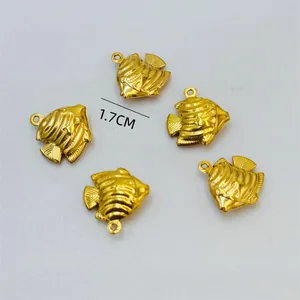 Detailed view of golden tropical fish pendant charms for jewelry making, 1.7cm size