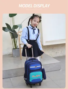 Asian girl posing with a blue trolley schoolbag featuring silent wheels and large capacity