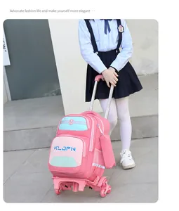 Close-up of pink rolling school bag with stair-climbing wheels shown in outdoor setting