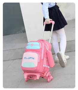 Pink girls trolley schoolbag with climbing wheels being pulled on pavement