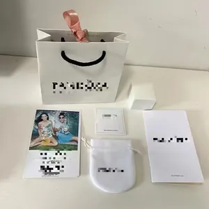 Full white jewelry gift packaging set including shopping bag velvet pouch and polishing cloth