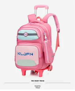 Slightly side view of a pink children's rolling backpack with trolley handle
