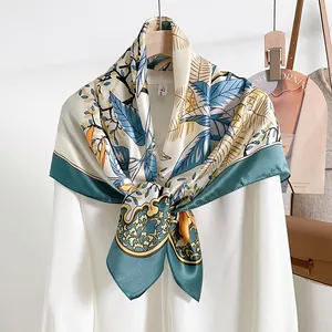 Elegant floral print silk scarf made of premium crepe satin texture for autumn styling