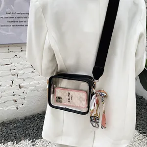 Sac à bandoulière transparent en PVC avec large sangle noire et ruban décoratif