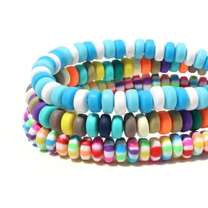 Close-up of colorful polymer clay disc beads for DIY jewelry making and bracelets