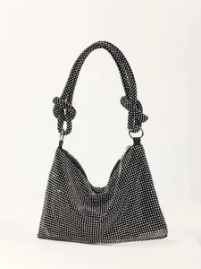 Elegant black party clutch with sparkling crystal mesh and decorative knotted strap