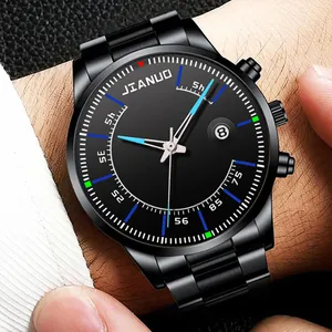Close-up of black men's sports watch with JIANUO logo and multi-color dial scales