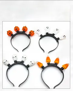 Halloween LED headbands featuring pumpkin, ghost, skull, and candy corn designs