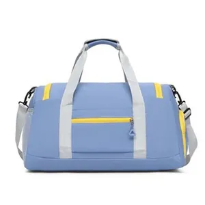 Front view of a minimalist blue and yellow travel duffel bag with handles