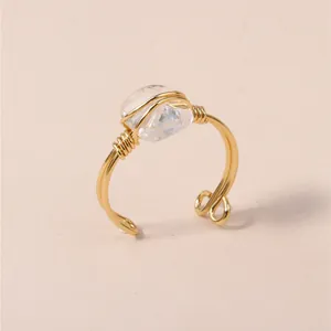 Handmade natural white crystal wire-wrapped open ring with gold-plated band design