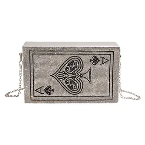Pochette de soirée étincelante avec strass motif as de pique et chaîne d'argent