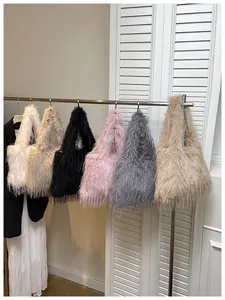 Detailed view of stylish faux fur tote bags in multiple colors hanging on a rack