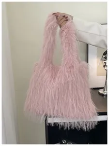 Macro view of the soft pink faux fur material on this large capacity plush tote bag
