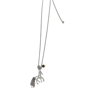 Detailed view of a silver metal horse pendant necklace featuring a chain tassel and bead