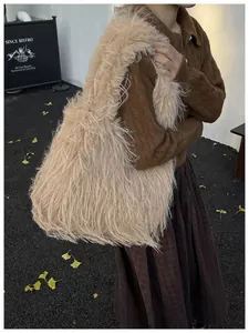 Fuzzy shaggy tote bag styled with autumn outfit in a street photography setting