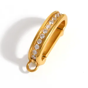 Close-up of a gold-plated stainless steel clasp with embedded rhinestones for DIY crafts.