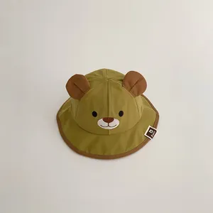 Adorable olive green baby bear bucket hat with 3D ears and embroidered face for sun protection