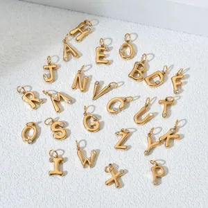 Close-up of 26 stainless steel alphabet pendants with sparkling embedded crystals
