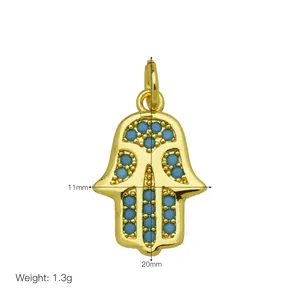 Gold-plated Hamsa hand pendant with blue stones and dimension details 11x20mm