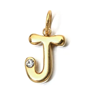Close-up detail of a gold-plated stainless steel letter J pendant with sparkling birthstone