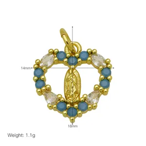 Detailed view of 18K gold-plated heart pendant with Virgin Mary icon and blue stones