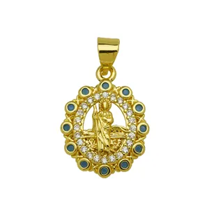 Detailed macro view of religious figure pendant in 18K gold plating with colorful zircons