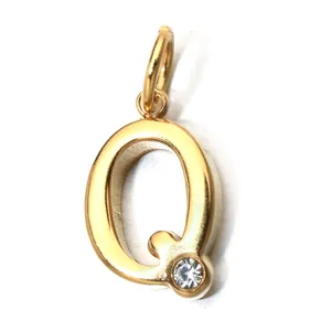 Close-up of gold-plated stainless steel letter Q pendant with sparkling birthstone detail