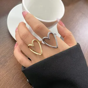 Minimalist hollow heart open ring set in gold and silver finishes for stylish women