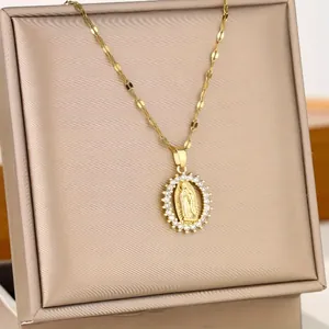 Exquisite close-up of gold-plated Virgin Mary pendant adorned with white zirconia stones