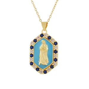 Detailed view of a vintage gold-plated hexagonal pendant featuring Madonna relief and blue enamel.