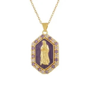 Detailed macro view of retro Virgin Mary relief pendant with purple enamel and rhinestones