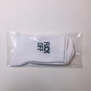 High quality white cotton crew socks with bold FUCK OFF slogan in clear packaging