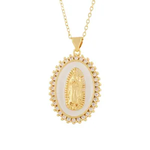 Close-up of vintage relief pendant with Virgin Mary portrait and sparkling rhinestone stones