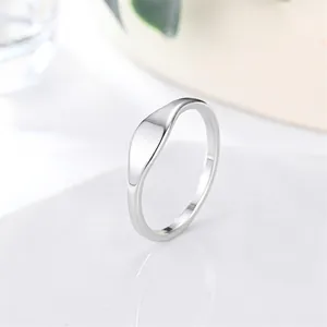 Minimalist silver stainless steel signet ring with smooth polished finish for women