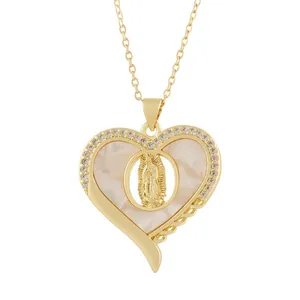 Vintage gold heart pendant with Virgin Mary relief, mother of pearl and crystals.