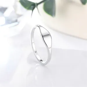 Elegant minimalist glossy stainless steel ring for women in a bright silver finish