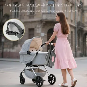 Vue détaillée de l'attache de crochet de poussette pour un tapis à langer portable