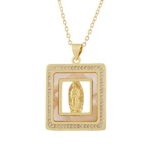 Detailed view of a vintage square pendant with Our Lady of Guadalupe and shell inlay
