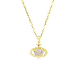 Elegant gold heart pendant necklace featuring pearls and a large clear crystal stone.