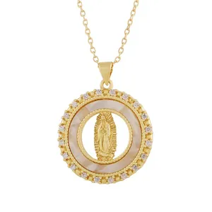 Detailed close-up shot of Virgin Mary relief pendant with shell inlay and crystals