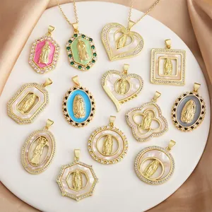 Collection of vintage gold-plated religious relief pendants with enamel and shell