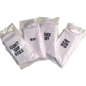 Set of white cotton socks with bold English slang and profanity slogans