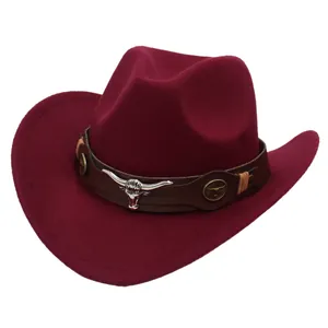 Classic vintage burgundy felt cowboy hat with bull head ornament and brown leather band.
