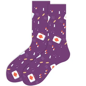 Detailed view of purple crew socks with cartoon medical icons like first aid kits